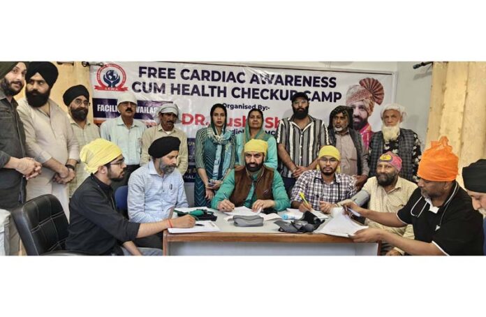 HoD Cardiology GMC & SSH Jammu Dr Sushil Sharma examining patients at Nanak Nagar, Jammu on Sunday. HoD Cardiology GMC & SSH Jammu Dr Sushil Sharma examining patients at Nanak Nagar, Jammu on Sunday.