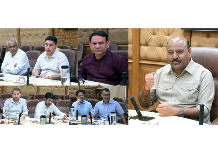 Deputy Chief Minister Surinder Choudhary chairing a meeting in Jammu.