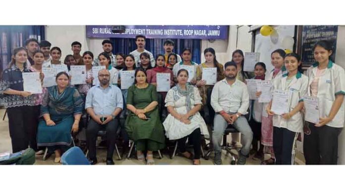 Candidates participated in Assistant Book Keeper Training Programme posing for a group photograph in Jammu.