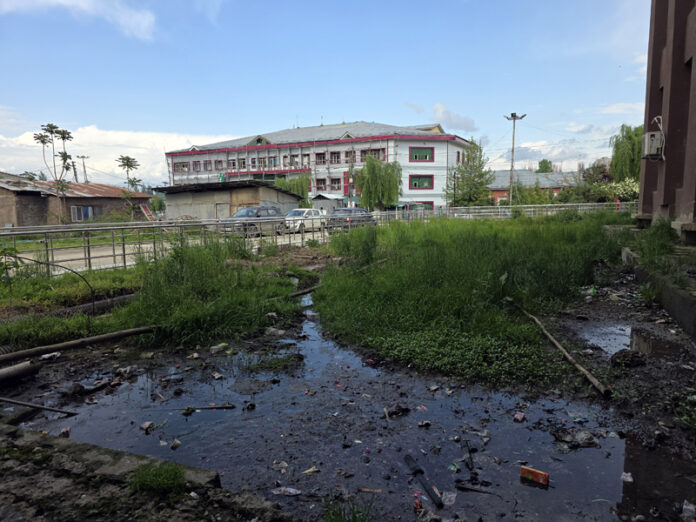 Sewage overflow and clogged drainage at Government Medical College Baramulla. -Excelsior/Aabid Nabi