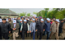 A large number of people participating in the Pad Yatra in Kupwara on Friday.