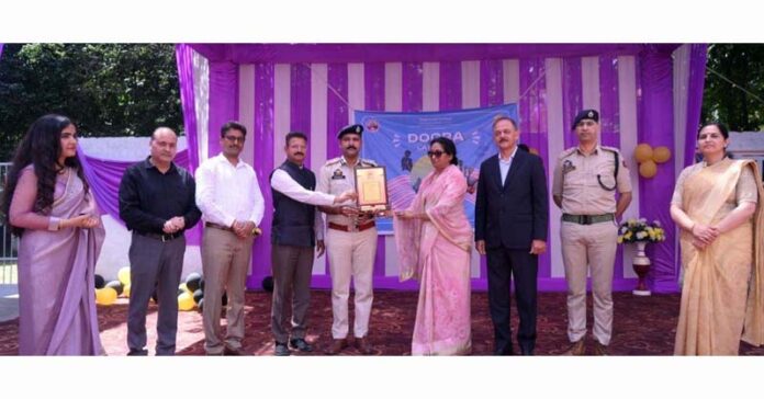 School Management presenting memento to a dignitary.