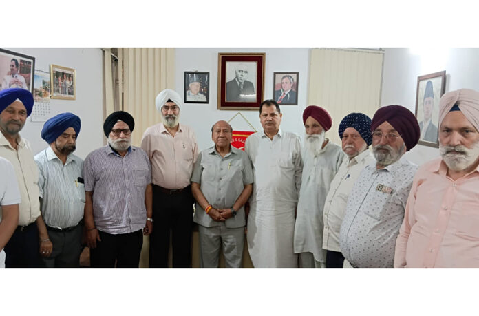 NC’s Provincial President R L Gupta during meeting with a delegation from Gole Gujral in Jammu on Friday.