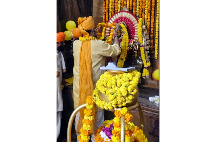 Ranvijay Singh offering prayers at Karaneshwar Temple in Jammu.