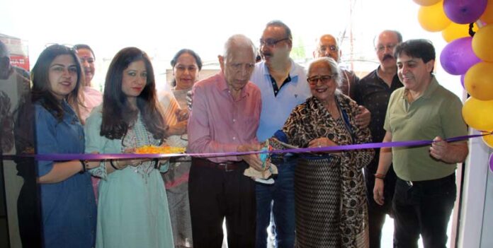 Bhagwant Dang and Pushpa Dang inaugurating new outlet of Tawi Building Material in Jammu. -Excelsior/Rakesh