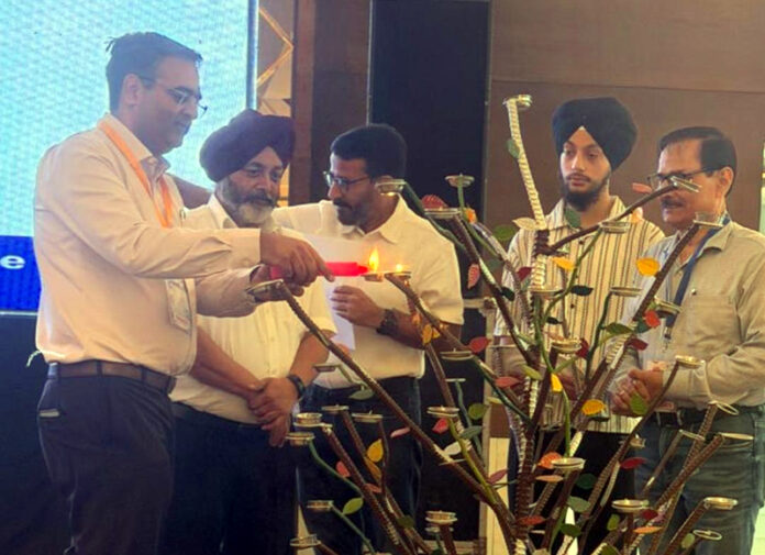 Dr Krishna Kumar along with others inaugurating a conference in Pathankot.