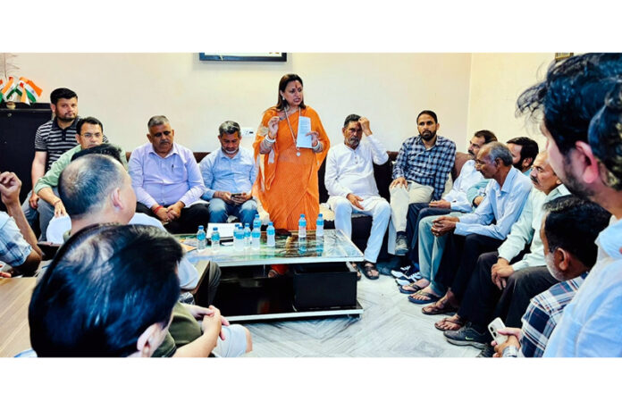 Senior BJP leader Rekha Mahajan chairing a meeting of party workers in district Samba.