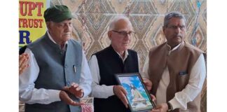 Prof B.L. Saraf retired Sessions Judge being presented a portrait of Acharya Abhinavgupt by Ashok Kangan and Dr K.N. Pandita at a function at Jammu on Sunday.