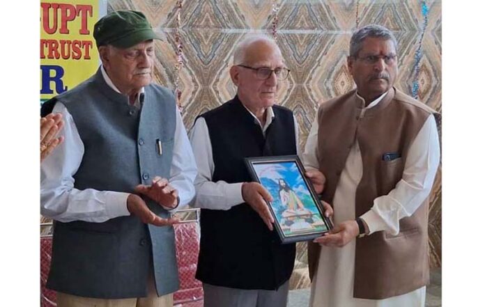 Prof B.L. Saraf retired Sessions Judge being presented a portrait of Acharya Abhinavgupt by Ashok Kangan and Dr K.N. Pandita at a function at Jammu on Sunday. Prof B.L. Saraf retired Sessions Judge being presented a portrait of Acharya Abhinavgupt by Ashok Kangan and Dr K.N. Pandita at a function at Jammu on Sunday.