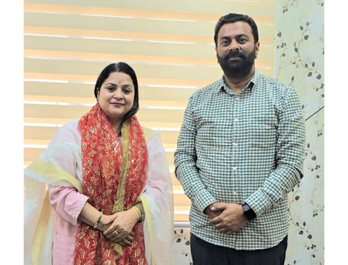 Samvedna Society chairman, Keshav Chopra during a meeting with Kanta Devi, Regional Director Survey and Land Records.