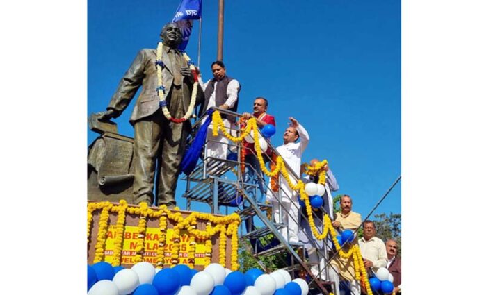 J&K BJP president and MP Sat Sharma leading other party leaders in paying homage to Dr BR Ambedkar at Jammu. -Excelsior/Rakesh J&K BJP president and MP Sat Sharma leading other party leaders in paying homage to Dr BR Ambedkar at Jammu. -Excelsior/Rakesh