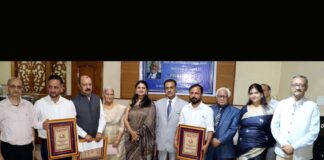 Awardees pose with Chief Justice Jammu, Kashmir and Ladakh High Court Justice Arun Palli, Press Club president Sanjeev Pargal, Maneesh Chhibber and Trust members. -Excelsior/Rakesh
