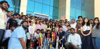 Engineering students posing with rockets at main campus CUJ during culmination of two day workshop on Monday.