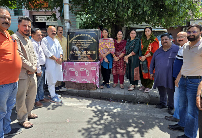 MLA Yudhvir Sethi inaugurating the slab upgradation work at Indira Chowk on Tuesday.