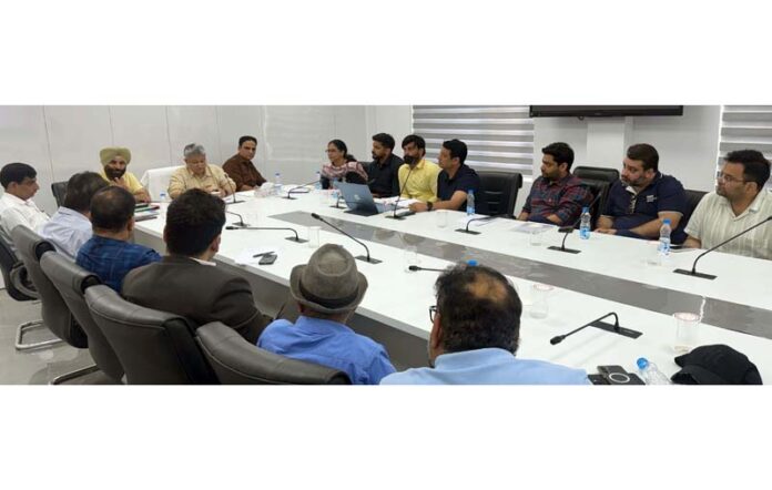 Transport Commissioner chairing a meeting at Jammu on Tuesday.