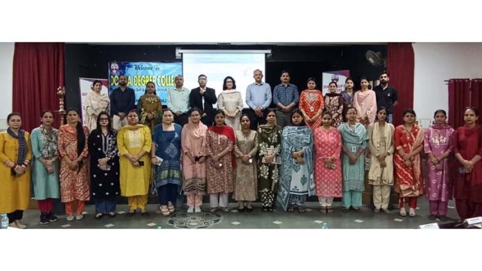Dignitaries pose for a group photograph after an expert session at Dogra Degree College.