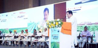 Minister Javid Dar addressing a gathering at Lucknow on Friday.