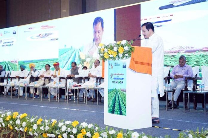 Minister Javid Dar addressing a gathering at Lucknow on Friday.