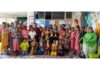 Students and others posing for a group photograph during a children's Dogri dance festival in Jammu on Saturday.