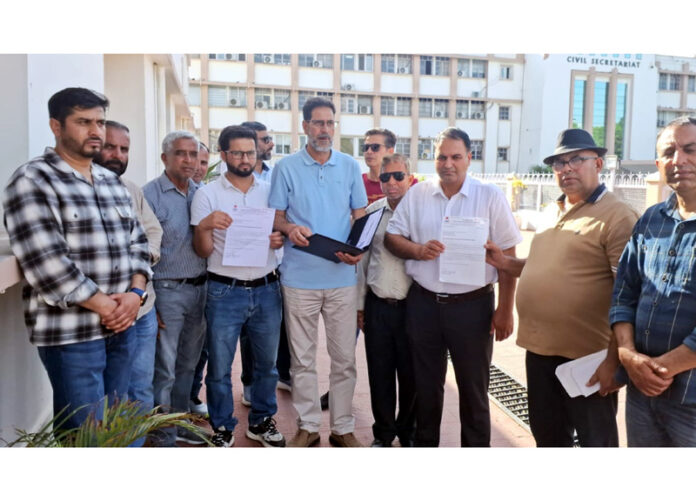 PHE contractors delegation coming out of Civil Secretariat Jammu after meeting Minister Javed Rana.