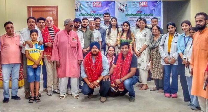 Organizers posing with doctors and prominent locals during a health checkup camp at Peer Mitha, Jammu. Organizers posing with doctors and prominent locals during a health checkup camp at Peer Mitha, Jammu.