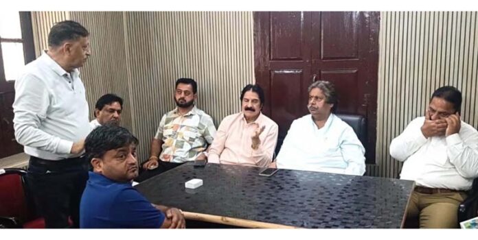 Senior Cong leaders Raman Bhalla and Yogesh Sawhney during meeting in Jammu.