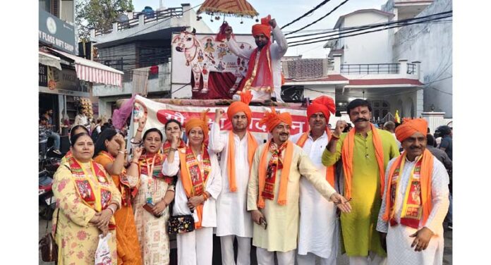 Devotees during a procession on Hanuman Jayanti in Jammu on Thursday.
