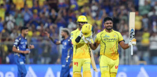 Sanju Samson raising his bat after scoring 101 runs in 54 balls against Mumbai Indians on Thursday.