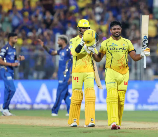 Sanju Samson raising his bat after scoring 101 runs in 54 balls against Mumbai Indians on Thursday.