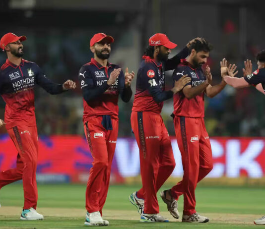 RCB players celebrating after defeating CSK in Bengaluru.