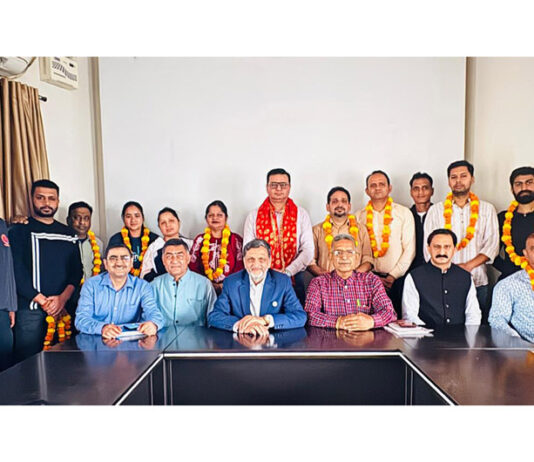 Newly nominated members posing for a group photograph.