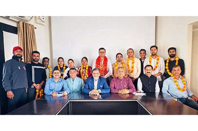 Newly nominated members posing for a group photograph.