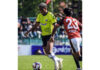 Football players in action during match at TRC Ground Srinagar on Sunday.