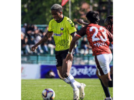Football players in action during match at TRC Ground Srinagar on Sunday.