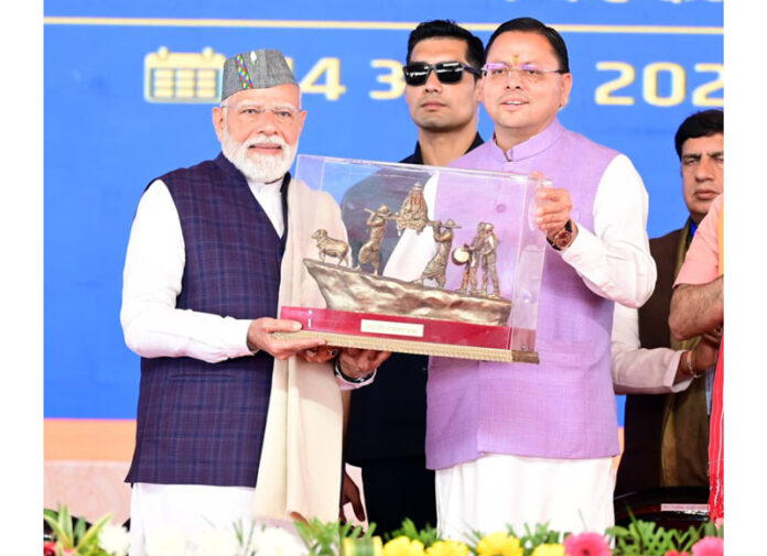 PM Narendra Modi at a pubic meeting at Dehradun on Tuesday.