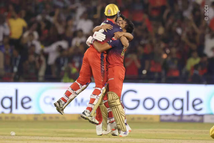 RCB players celebrating after defeating Mumbai Indians by 2 wickets at Raipur on Sunday.