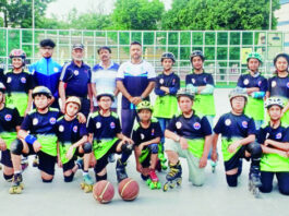 J&K Sub Junior Roll Ball team posing along with support staff.