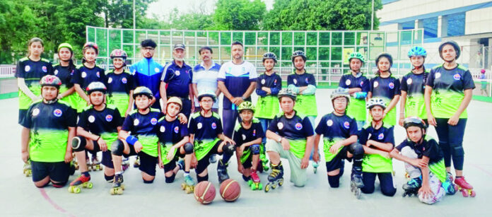 J&K Sub Junior Roll Ball team posing along with support staff.