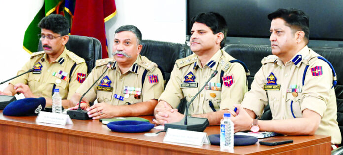 DIG UR-Range, Shiv Kumar Sharma, along with other police officers during a meeting at SKPA Udhampur on Monday.