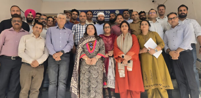 Dignitaries participating in different training programmes at SCERT Jammu posing for a group photograph on Monday.