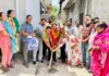 MLA Bahu, Vikram Randhawa kick starting lane-drain work in Gorkha Nagar on Saturday.