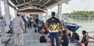 Malaysia searches for 14 missing  Indonesians after boat sinks