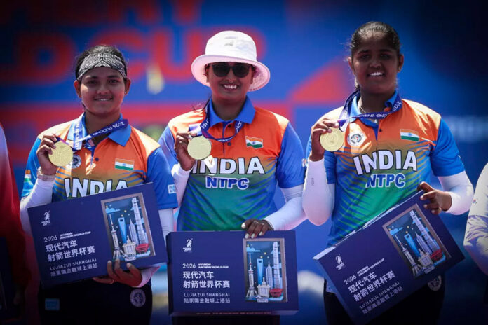 Indian Archers posing with gold medals during prize distribution ceremony. Indian Archers posing with gold medals during prize distribution ceremony.