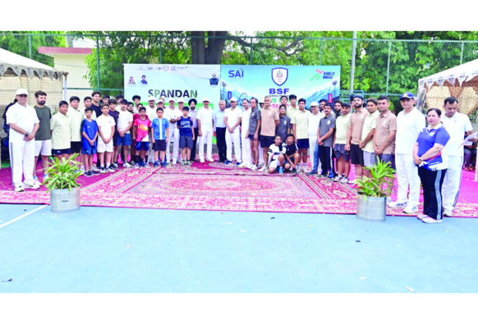 Shashank Anand, Inspector General, BSF Jammu posing along with organisers and tennis players during inaugural event. Shashank Anand, Inspector General, BSF Jammu posing along with organisers and tennis players during inaugural event.