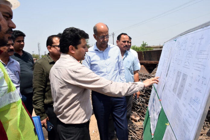 Advisor to Chief Minister inspecting work on a project in Jammu on Wednesday.