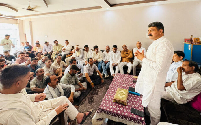 Pawan Khajuria addressing a public meeting in Majalta on Saturday. Pawan Khajuria addressing a public meeting in Majalta on Saturday.