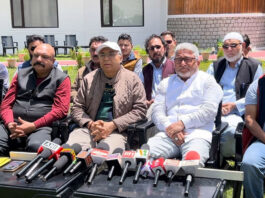 NC and Congress leaders at a media briefing in Kargil on Thursday. -Excelsior/Basharat Ladakhi
