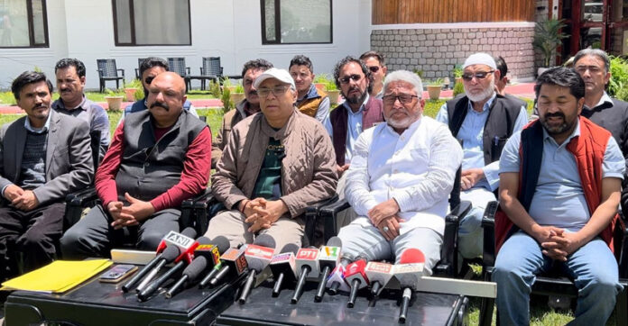 NC and Congress leaders at a media briefing in Kargil on Thursday. -Excelsior/Basharat Ladakhi