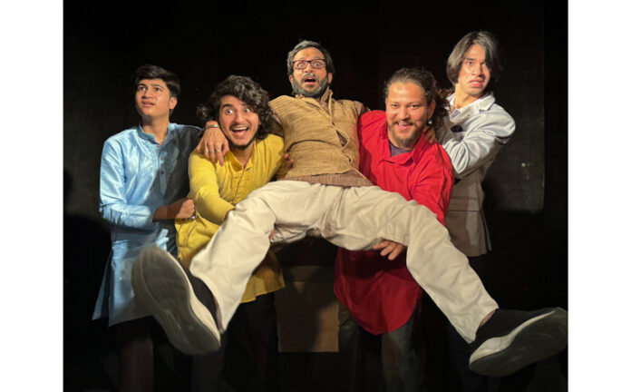 A scene from the play 'Do Kalakaar' being staged in Jammu on Sunday.