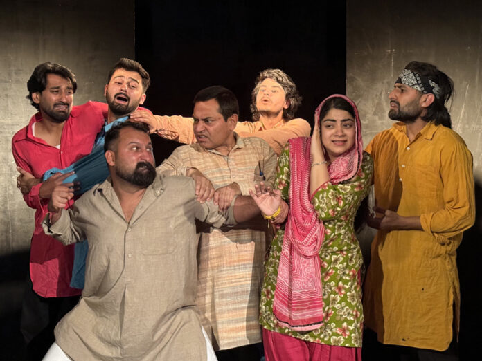 A scene from the play 'Aag' staged by Natrang in Jammu on Sunday.